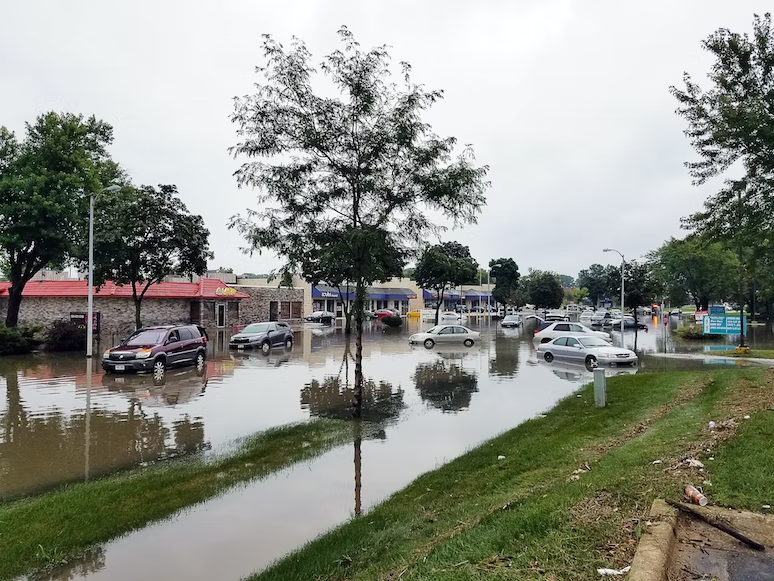 Flooded shopping center with cars
